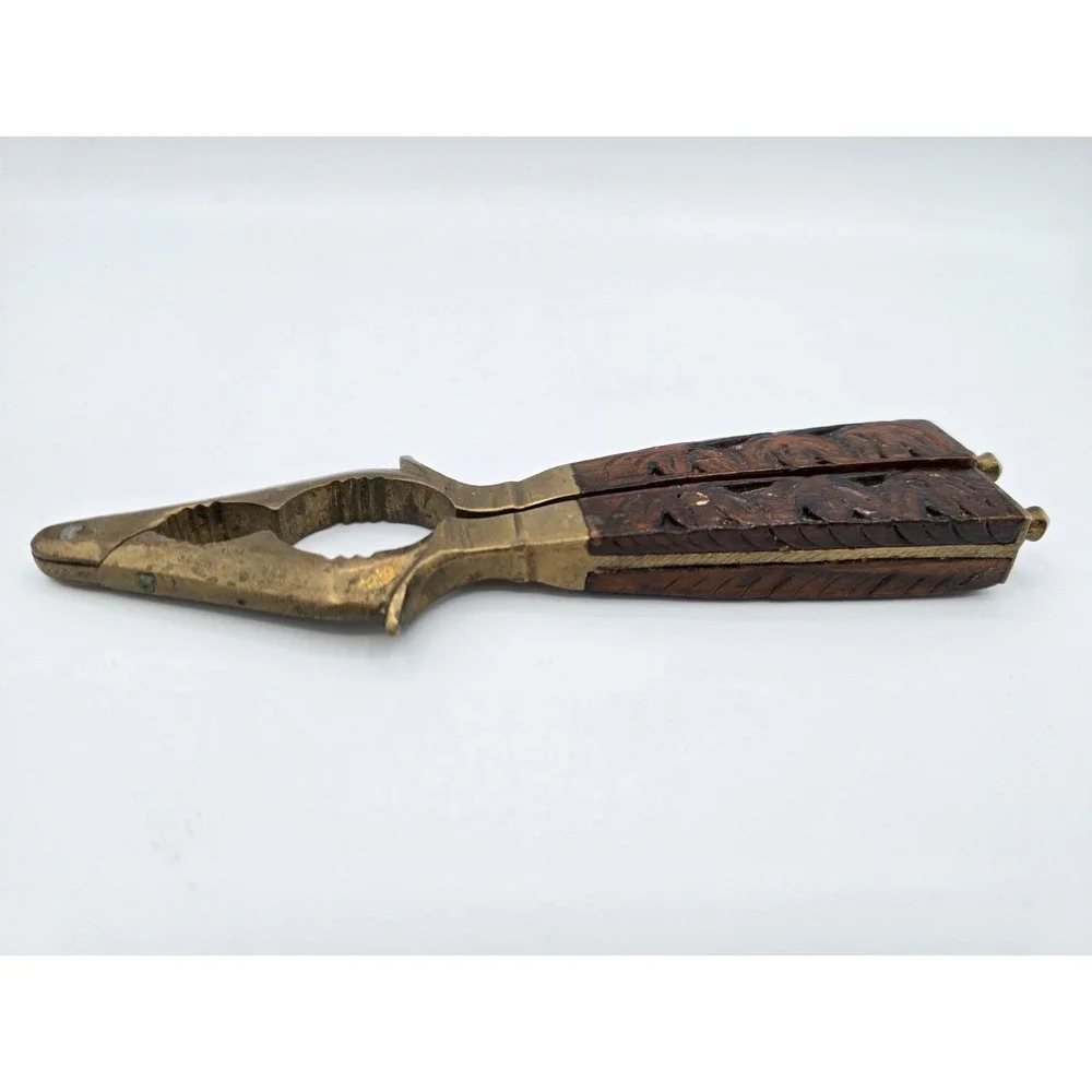 Vintage Wooden and Brass‎ Nutcracker with Hand-Carved Floral Design